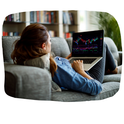 Relaxed learning with live market view on laptop